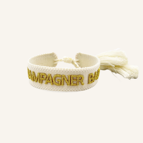 Bracciale in tessuto ricamato bianco con scritta oro "CHAMPAGNER BABY"